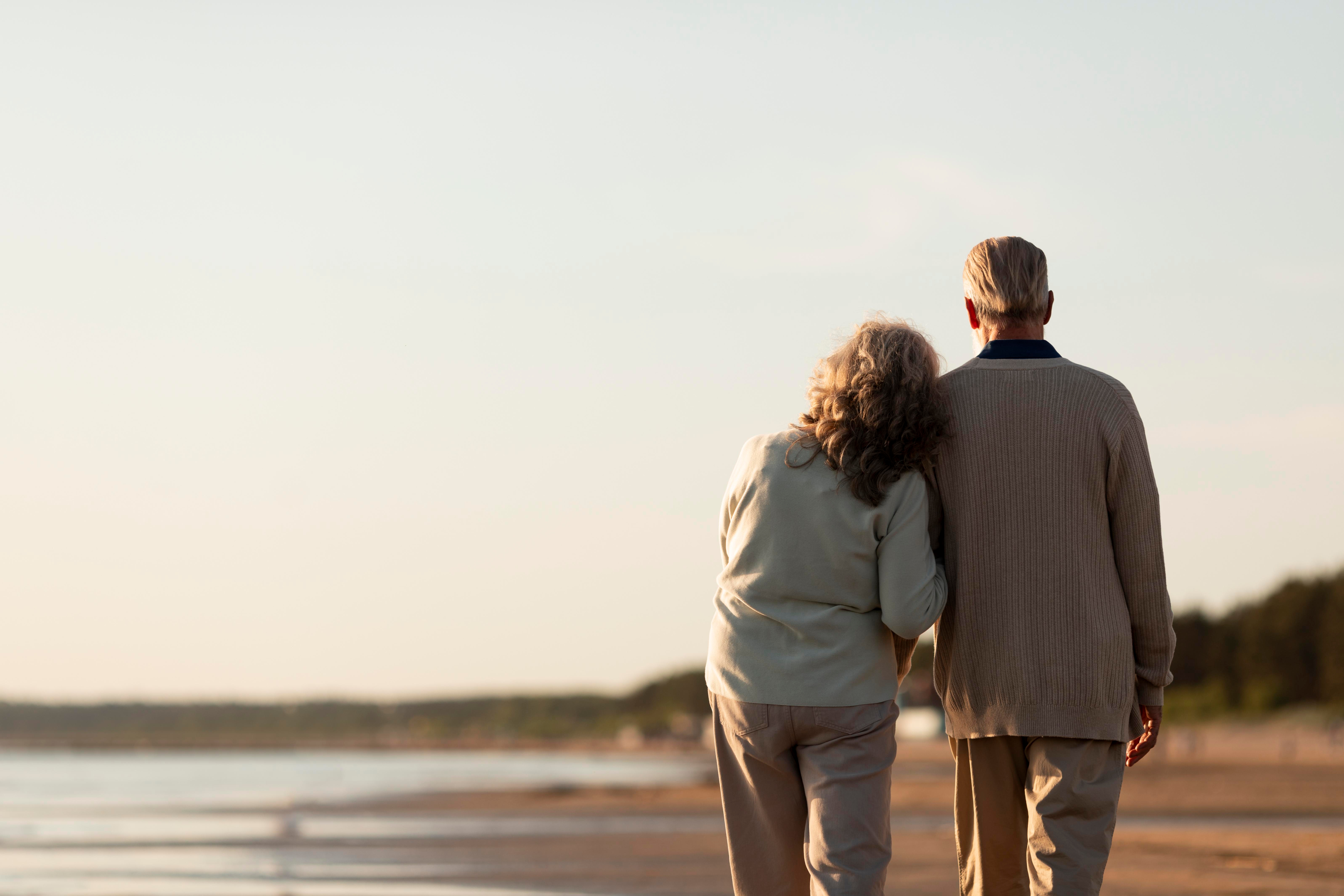 Older couple looking out over a landscape together